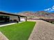 Artificial turf backyard with mountain views at 390 Peaceful St, Las Vegas, NV 89110