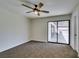 Bedroom with sliding glass door to backyard at 390 Peaceful St, Las Vegas, NV 89110