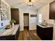 Laundry room featuring granite countertops and ample cabinet space at 390 Peaceful St, Las Vegas, NV 89110