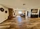 Open living room with stone fireplace and hardwood floors at 390 Peaceful St, Las Vegas, NV 89110