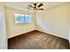 Bedroom with ceiling fan and neutral carpeting at 3981 Ebro Way, Las Vegas, NV 89103