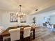 Bright dining area showcasing a large table and modern lighting at 3981 Ebro Way, Las Vegas, NV 89103