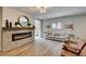 Living room with fireplace and hardwood floors at 3981 Ebro Way, Las Vegas, NV 89103