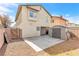 View of the backyard with a shed, patio and gravel landscaping at 4248 Tolkien Ave, Las Vegas, NV 89115