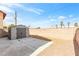 View of the backyard with a shed, patio and gravel landscaping at 4248 Tolkien Ave, Las Vegas, NV 89115