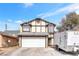 Charming two-story home featuring a two-car garage and Tudor-style accents at 4248 Tolkien Ave, Las Vegas, NV 89115