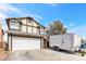 Charming two-story home featuring a two-car garage and Tudor-style accents at 4248 Tolkien Ave, Las Vegas, NV 89115