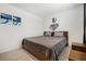 Comfortable bedroom with king-size bed and wall art at 4904 Siglo St, North Las Vegas, NV 89031