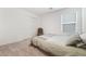 Bright bedroom with queen-size bed and sliding door at 4904 Siglo St, North Las Vegas, NV 89031