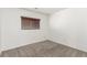 Simple bedroom with window and neutral carpeting at 531 Dairy Creek Ave, Las Vegas, NV 89183