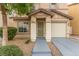 Front view of the house, showing walkway and entrance at 531 Dairy Creek Ave, Las Vegas, NV 89183