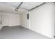 Attached garage with gray epoxy floor and extra storage space at 531 Dairy Creek Ave, Las Vegas, NV 89183