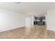 Open concept living room with kitchen view and tile floors at 531 Dairy Creek Ave, Las Vegas, NV 89183