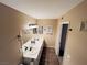 Well-lit bathroom featuring dual sinks and counter space at 5710 E Tropicana Ave # 2122, Las Vegas, NV 89122