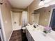 Clean bathroom featuring a shower-tub combo and vanity at 5710 E Tropicana Ave # 2122, Las Vegas, NV 89122