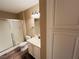 Clean bathroom with a shower/tub combo and white vanity at 5710 E Tropicana Ave # 2122, Las Vegas, NV 89122