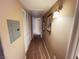 Hallway featuring fresh paint and neutral carpet at 5710 E Tropicana Ave # 2122, Las Vegas, NV 89122