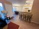 Living room with entryway and kitchen views at 5710 E Tropicana Ave # 2122, Las Vegas, NV 89122