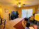 Living room with a sectional sofa and access to a patio at 5710 E Tropicana Ave # 2122, Las Vegas, NV 89122