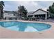 Relaxing community pool with surrounding landscaping at 5710 E Tropicana Ave # 2122, Las Vegas, NV 89122