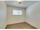 Cozy bedroom with neutral walls and carpet flooring at 607 Sierra Ln, Henderson, NV 89002