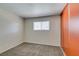 Simple bedroom with neutral walls, carpet, and sliding door closet at 607 Sierra Ln, Henderson, NV 89002