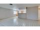 Living room with kitchen views and tile floor at 607 Sierra Ln, Henderson, NV 89002