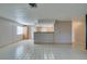 Living room with kitchen views and tile floor at 607 Sierra Ln, Henderson, NV 89002