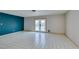 Living room with pool view and tile floor at 607 Sierra Ln, Henderson, NV 89002