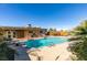 Large refreshing pool, spacious patio, and adjacent backyard space at 607 Sierra Ln, Henderson, NV 89002