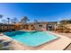 Relaxing backyard oasis featuring a sparkling pool at 607 Sierra Ln, Henderson, NV 89002