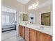 Double vanity bathroom with view of bedroom at 6075 Jutland Ave, Las Vegas, NV 89122