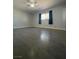 Spacious bedroom with ceiling fan and wood-look floors at 6552 Boxwood Ln, Las Vegas, NV 89103