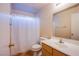 Bathroom featuring a single sink, toilet, and a shower with a white curtain at 6752 Lookout Lodge Ln # 1, North Las Vegas, NV 89084