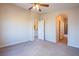 Spacious bedroom featuring neutral paint, carpet and a ceiling fan at 6752 Lookout Lodge Ln # 1, North Las Vegas, NV 89084