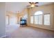 Inviting living room with ample natural light and cozy fireplace feature at 6752 Lookout Lodge Ln # 1, North Las Vegas, NV 89084