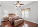 Spacious bedroom with hardwood floors and ceiling fan at 7220 Elderly Ave, Las Vegas, NV 89131