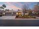 Single-story home with two-car garage and mature landscaping at 7220 Elderly Ave, Las Vegas, NV 89131