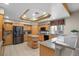 Well-equipped kitchen with granite countertops and an island at 7220 Elderly Ave, Las Vegas, NV 89131