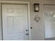 White door with light fixture and number 904 at 730 Oakmont Ave # 904, Las Vegas, NV 89109