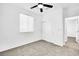 Bright bedroom with ceiling fan and double door closet at 7883 Bethel Heights Ln, Las Vegas, NV 89113