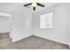 Bright bedroom with ceiling fan and double door closet at 7883 Bethel Heights Ln, Las Vegas, NV 89113