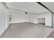 Attached garage with epoxy floor and extra storage at 7883 Bethel Heights Ln, Las Vegas, NV 89113