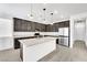 Modern kitchen with stainless steel appliances and an island at 7883 Bethel Heights Ln, Las Vegas, NV 89113