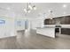 Modern kitchen with island and stainless steel appliances at 7883 Bethel Heights Ln, Las Vegas, NV 89113