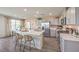 Modern kitchen with gray cabinets and quartz countertops at 791 Ruby Sedona Ave, North Las Vegas, NV 89081