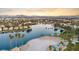 Lakefront community with sandy beach and palm trees at 7944 Marbella Cir, Las Vegas, NV 89128