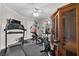 Home gym includes treadmill, exercise bike, and sauna at 7944 Marbella Cir, Las Vegas, NV 89128