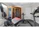 Home gym with various exercise equipment and a sauna at 7944 Marbella Cir, Las Vegas, NV 89128