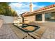 Enjoy this large hot tub with surrounding brick patio at 7944 Marbella Cir, Las Vegas, NV 89128